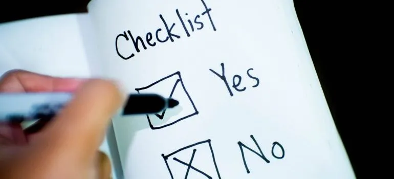 A person making a checklist.