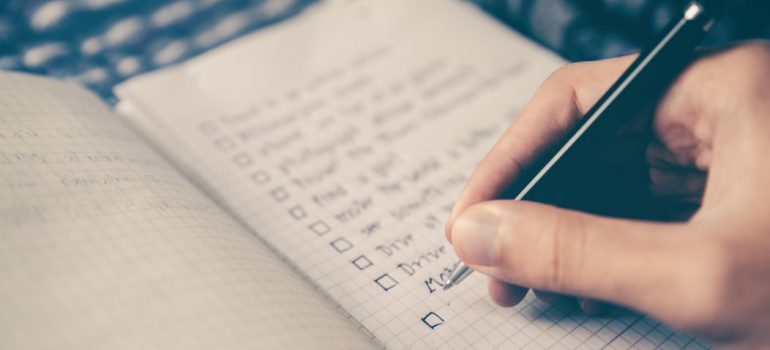 a person writing something down