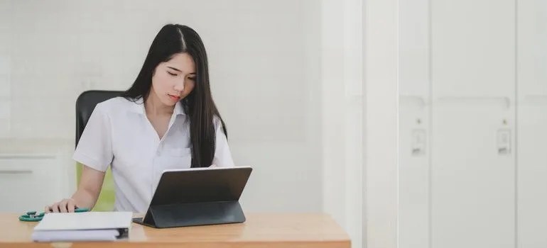 Woman reading reviews online.