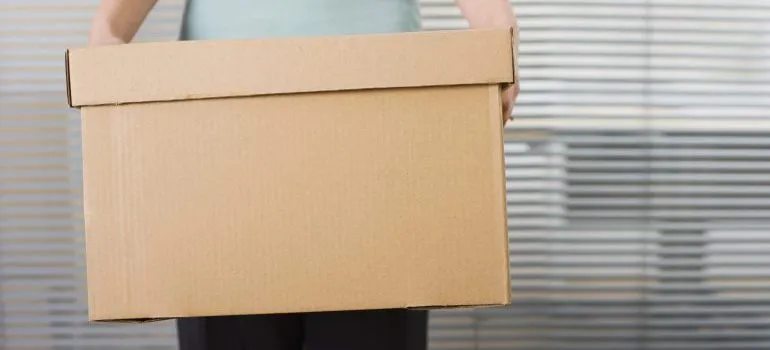 A person holding a box
