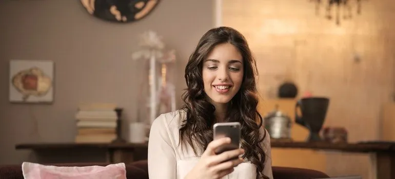 Woman looking at her phone.