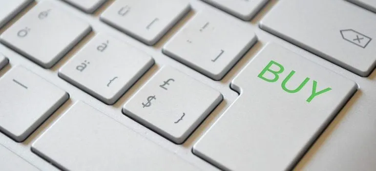 A white keyboard with a buy button.
