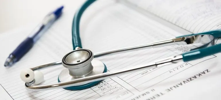 Stethoscope and clipboard.