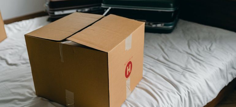 Box and suitcases to use when Packing for your Caldwell move.