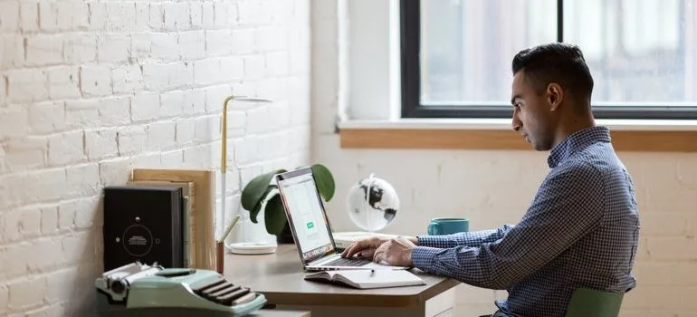 Person researching things to know about moving contracts.