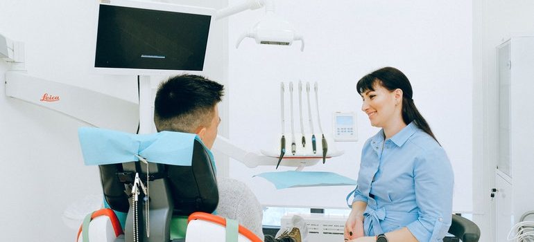 Doctor thinking if she should hire movers to relocate your medical practice.