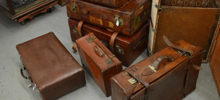 several old leather suitcases