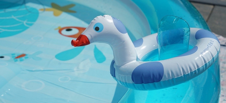 inflating toy and on a kids pool