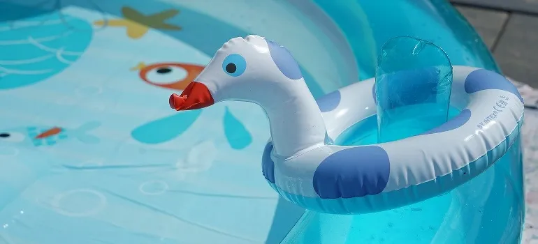 inflating toy and on a kids pool