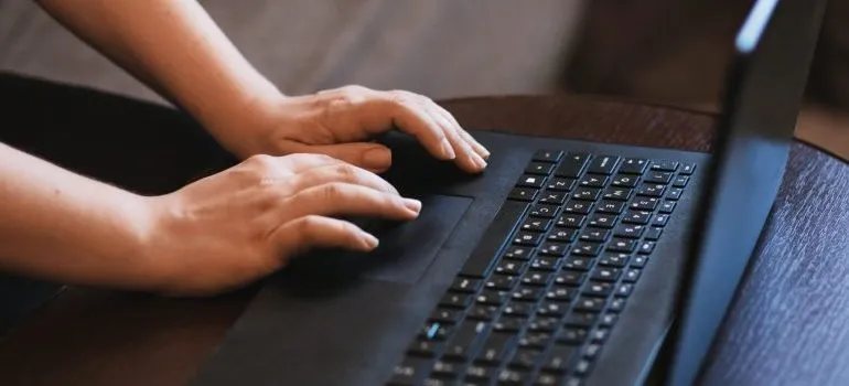 Typing on the laptop