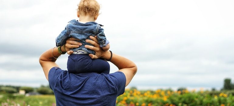 Man and child after moving to Idaho Falls from Meridian.