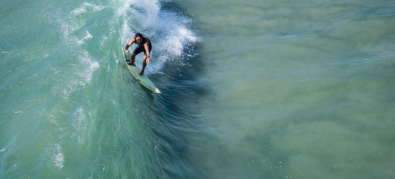 A surfer riding a wave
