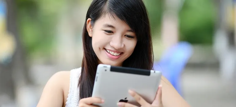woman using tablet