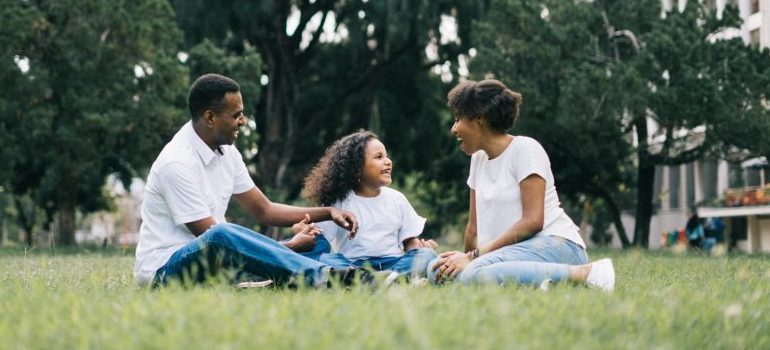 family-sitting-in-the-park