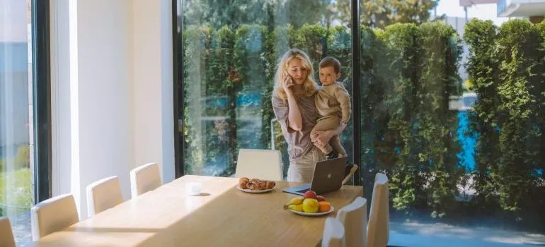 woman with a baby in the dinning room