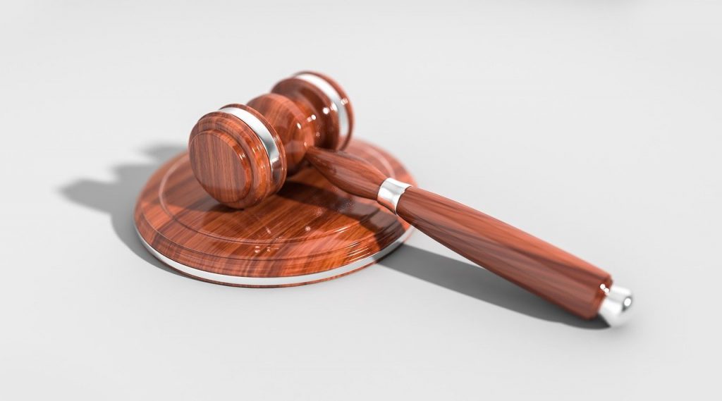 Wooden hammer signifies closed deal when auctioning off your old home in Idaho