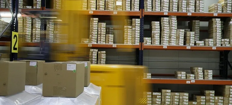 Warehouse racks with boxes.