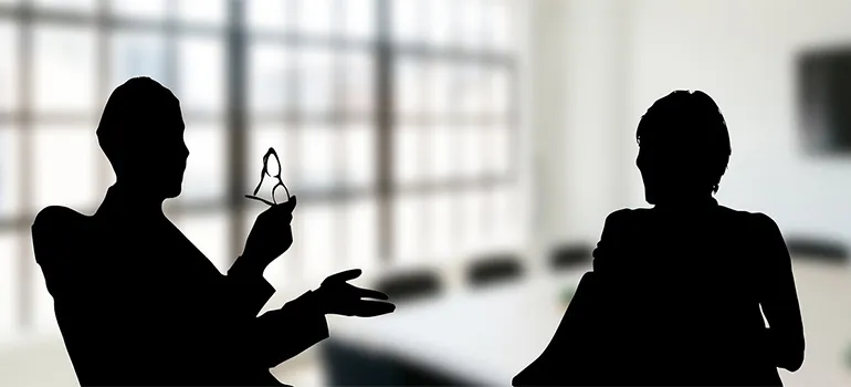 two silhouettes talking