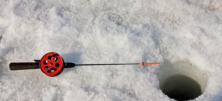 ice fishing pole and a hole