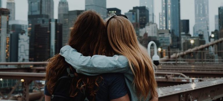 two female friends, hugging
