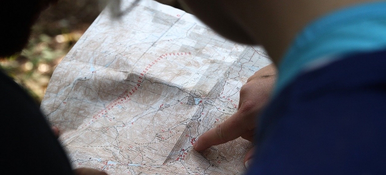 a person looking at a map