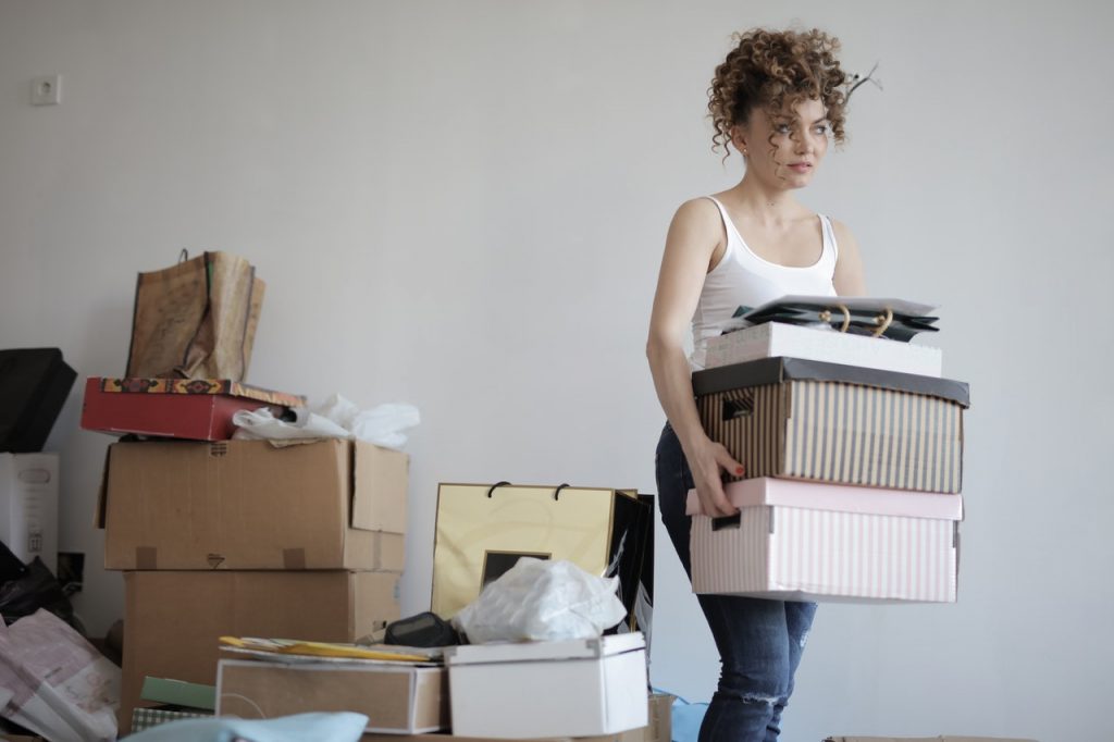Woman decluttering home during COVID-19