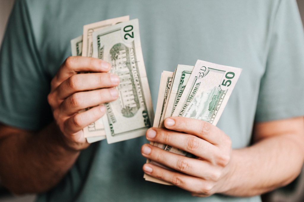 Person counting money
