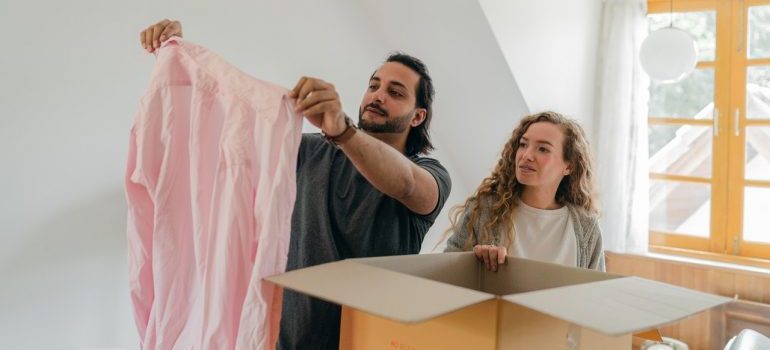 Couple decluttering home during COVID-19