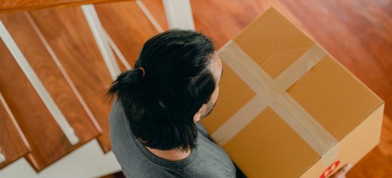 Man carrying a box