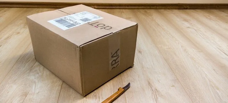 A moving box on the floor.
