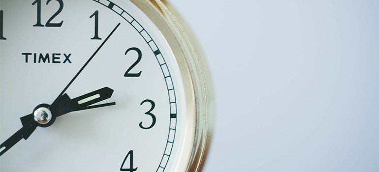 A clock on a white wall