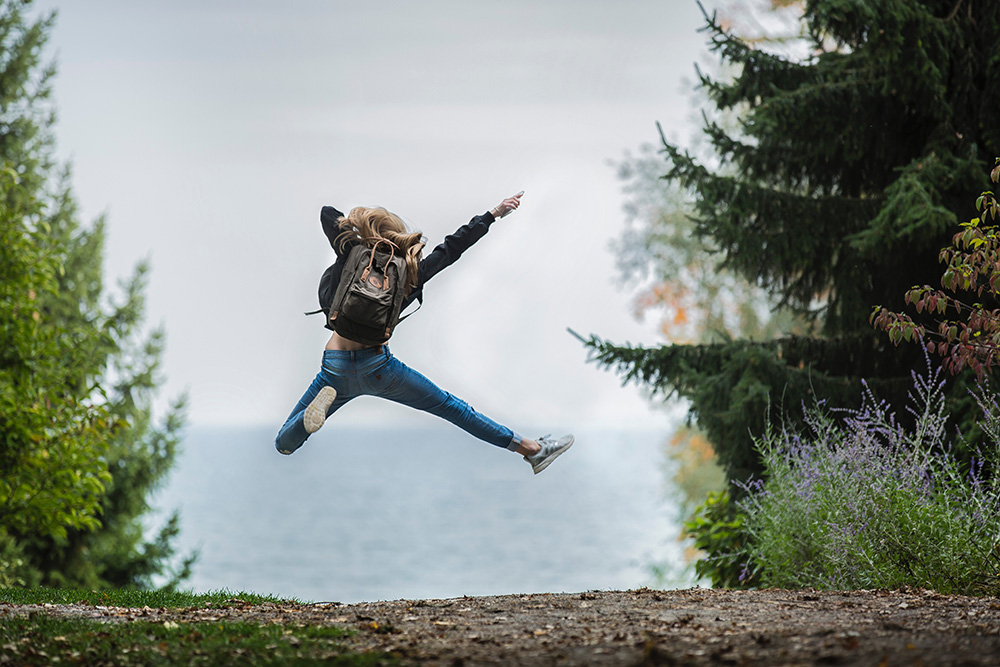 A girl being happy about knowing our Eco-friendly packing and moving