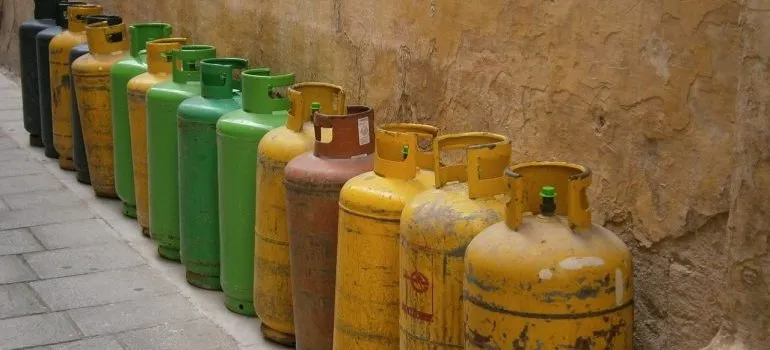 A row of gas bottles.