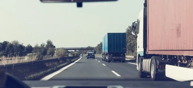 LTL shipping trucks on the road.