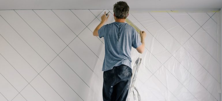 Man painting a wall