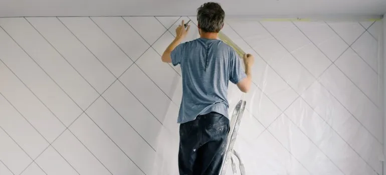 Man painting a wall