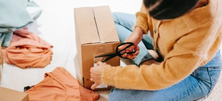 Woman decluttering to prepare for springtime in Boise