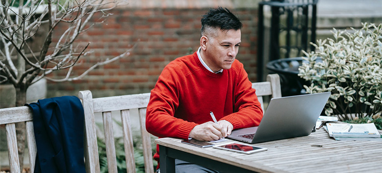 A man doing some research on the internet