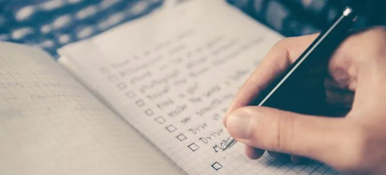 A person making a checklist.