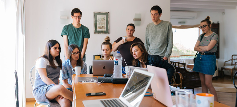 A team of people working on a project in an office