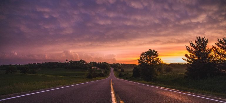 A long road at sunset.