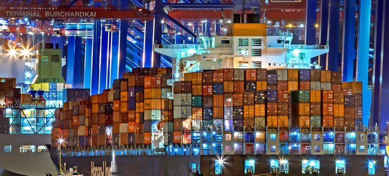 A freight ship stacked with crates