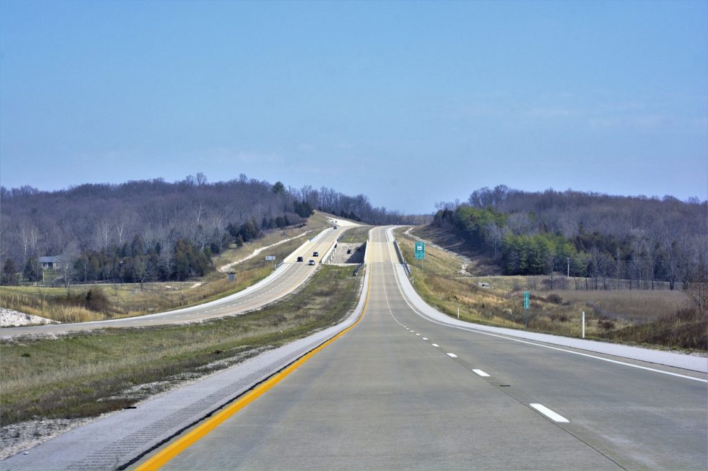 A long and empty highway.
