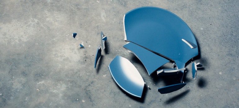 a broken plate on the floor