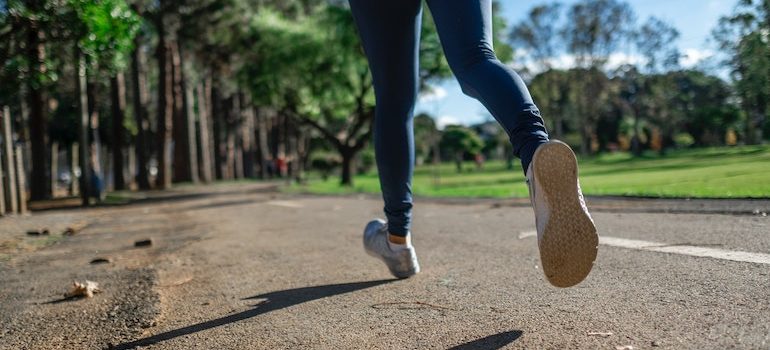feet running on a road