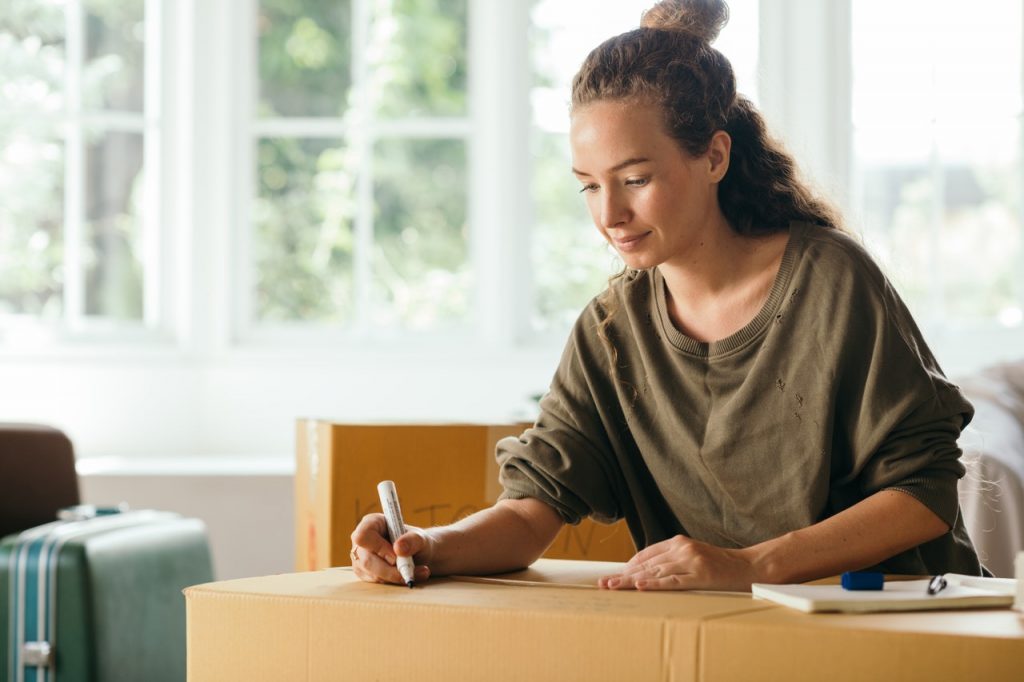 A woman preparing for moving from Colorado to Idaho.