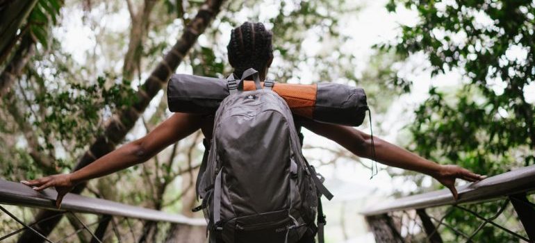 A man hiking in the woods.