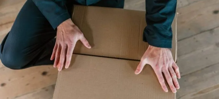 Man packing a box