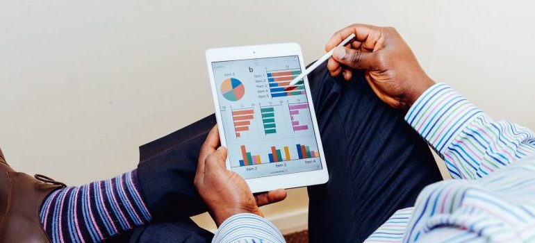 person looking at charts
