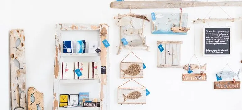 Items on the wall to get rid of in order to simplify your home after moving.